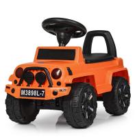 купить Детская каталка-толокар Bambi M 3898L-7 с кожаным сиденьем (оранжевая)